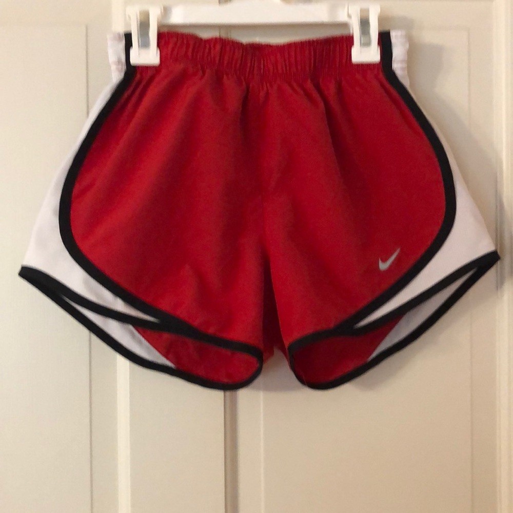 Red Nike shorts